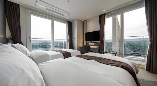 Katil atau katil-katil dalam bilik di Kintex by K-tree