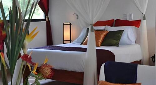 Letto o letti in una camera di Flamingo Hotel