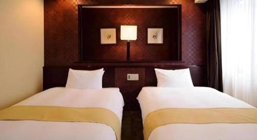 Ένα ή περισσότερα κρεβάτια σε δωμάτιο στο Chisun Hotel Utsunomiya