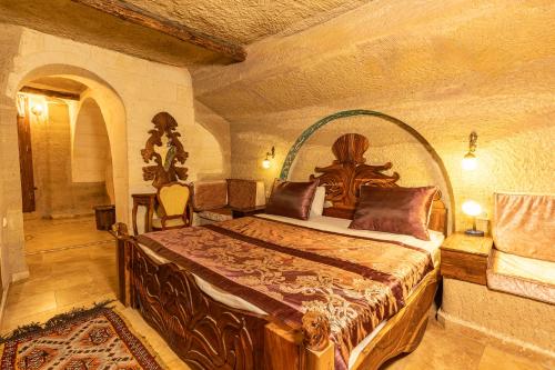a bedroom with a large bed in a building at Walnut House in Goreme