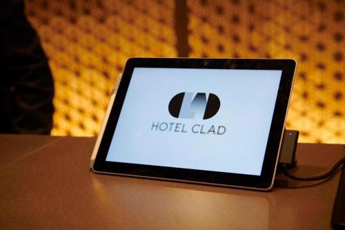 a tablet computer sitting on top of a table at HOTEL CLAD in Fuji