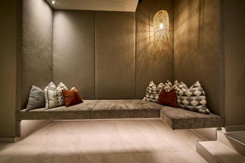 Ένα ή περισσότερα κρεβάτια σε δωμάτιο στο The Poolhouse Boutique Lodge