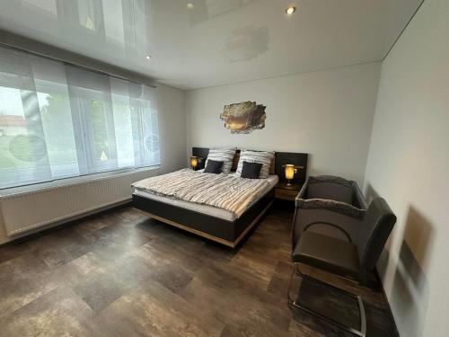 Postel nebo postele na pokoji v ubytování Heidis Ferienoase