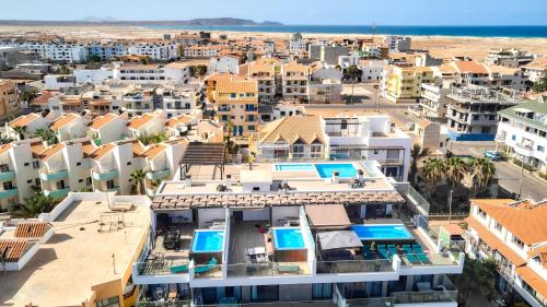an aerial view of a city with buildings at Apartamentos Golfinho Dourado in Santa Maria