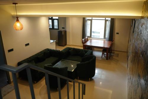 Un lugar para sentarse en Enchanting Pines Villas By Infinity