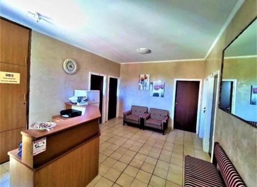 a lobby of a hospital with a waiting room at San Valentino hostel in Bašanija