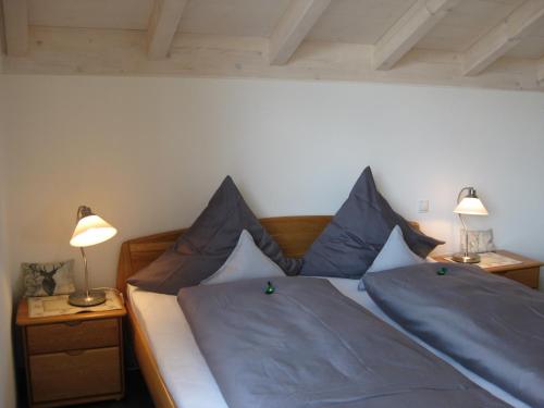 Bergblick Lodge tesisinde bir odada yatak veya yataklar