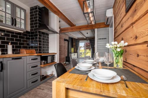 Kuchyň nebo kuchyňský kout v ubytování Apartamenty Szelągówka, Sun & Snow