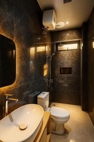 Ένα μπάνιο στο Nareswara Guest House