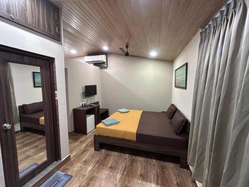 Μια τηλεόραση ή/και κέντρο ψυχαγωγίας στο FabHotel Coco Homes