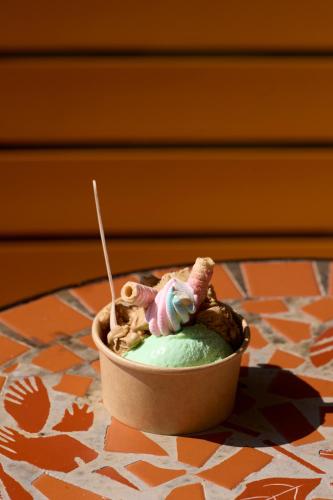 a toy sitting on top of a green ice cream at Atlantica Aegean Blue in Kolimbia