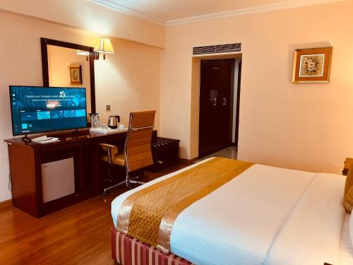 Ein Bett oder Betten in einem Zimmer der Unterkunft Inter Luxury Hotel