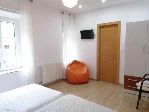 TV a/nebo společenská místnost v ubytování El Refugio Alojamiento Rural