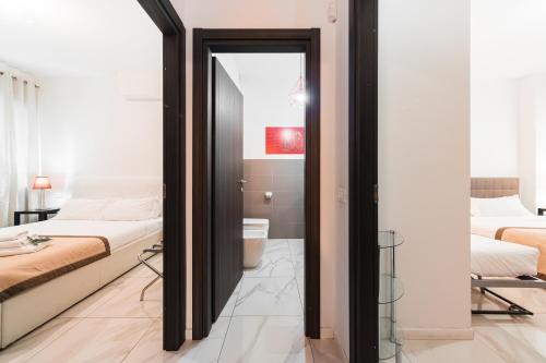 Ένα ή περισσότερα κρεβάτια σε δωμάτιο στο Grand Central Room
