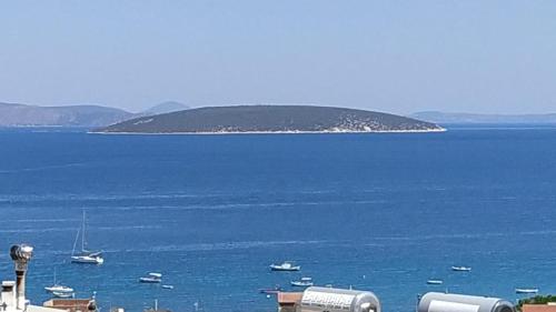 an island in the middle of a large body of water at Evelina's House in Tolo
