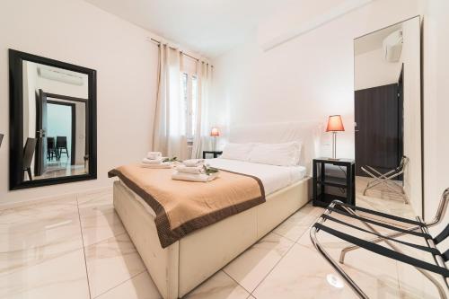 Ένα ή περισσότερα κρεβάτια σε δωμάτιο στο Grand Central Room
