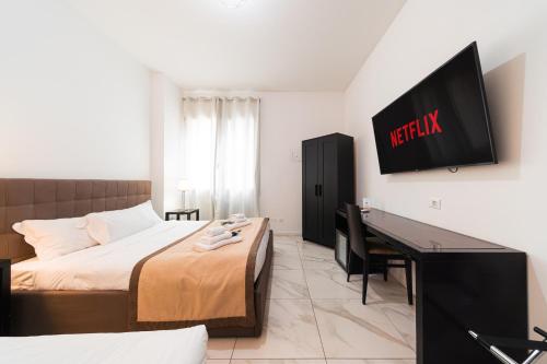 Ένα ή περισσότερα κρεβάτια σε δωμάτιο στο Grand Central Room