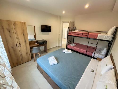 Giường trong phòng chung tại Villa Ftery