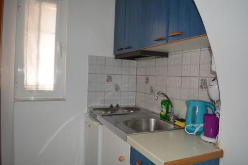 Kuchyň nebo kuchyňský kout v ubytování Volta Stonehouse Apartments