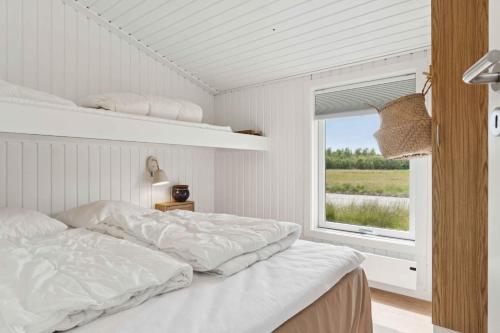 Ένα ή περισσότερα κρεβάτια σε δωμάτιο στο Scenic Holiday Home In Bratten