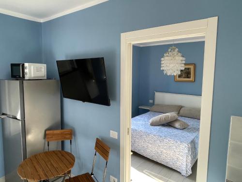 Cama o camas de una habitación en Appartamenti di Lusso Maratea