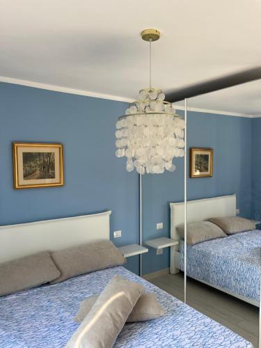 Cama o camas de una habitación en Appartamenti di Lusso Maratea