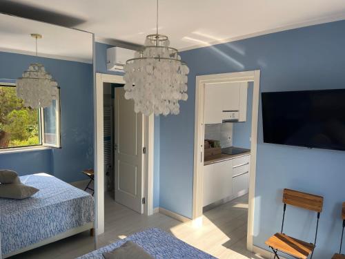 Cama o camas de una habitación en Appartamenti di Lusso Maratea
