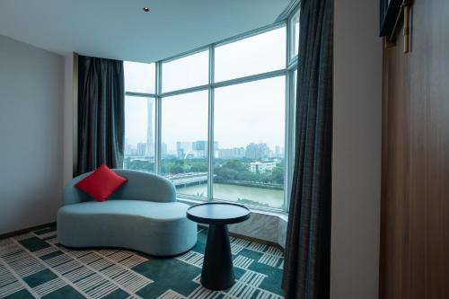 Zona de estar de Ramada by Wyndham Pearl Guangzhou-Canton Fair Free Shuttle Bus