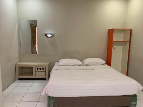 Katil atau katil-katil dalam bilik di Royal Kencana Hotel powered by Cocotel