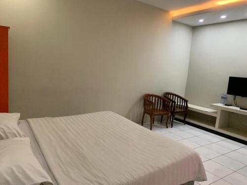 Katil atau katil-katil dalam bilik di Royal Kencana Hotel powered by Cocotel
