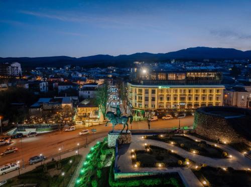 a view of a city at night at Holiday Inn Telavi by IHG in Tʼelavi