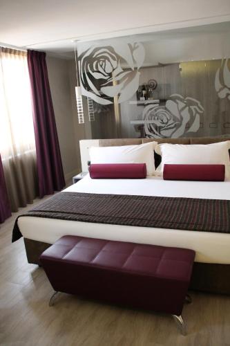 Uma cama ou camas num quarto em Hotel Soperga