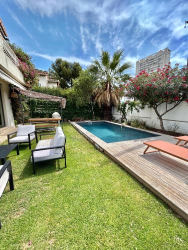 Photo de la galerie de l'établissement Villa Mimosas - 4 chambres climatisées, jardin, piscine chauffée proche Vélodrome - Quartier Ste Marguerite, à Marseille