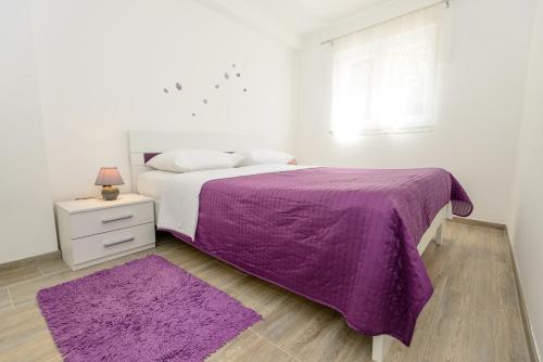 Katil atau katil-katil dalam bilik di Apartments Marija