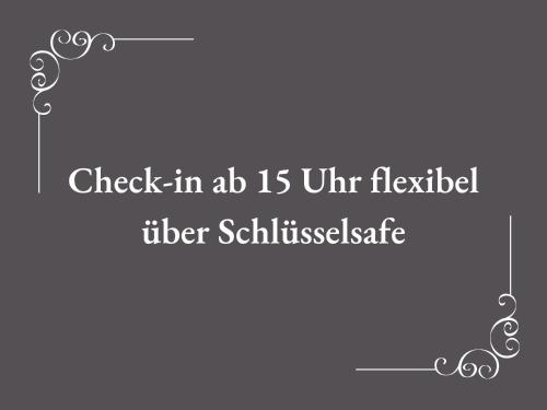 a sign that reads check in dc is unassisted under scholiosisete at Brandneu - Fewo Sweethome mitten in Lutherstadt Wittenberg - ruhige Seitenstraße - eigener Parkplatz - Einkaufen, Restaurants & Schlosskirche 2 Min zu Fuß - Waschmaschine - Smart-TV - vollausgestattet in Lutherstadt Wittenberg