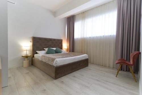 Ένα ή περισσότερα κρεβάτια σε δωμάτιο στο Apartments Lukas 6