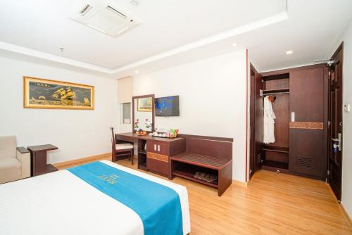 Cama o camas de una habitación en Galliot Hotel Nha Trang