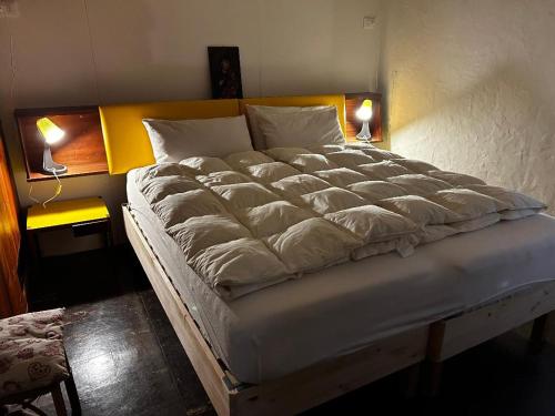 Postel nebo postele na pokoji v ubytování Chalet La Stella a Corte