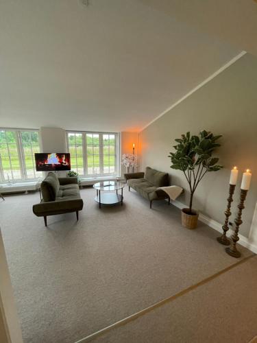 Coin salon dans l'établissement Apartment in countryside 3 bedroom