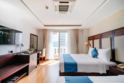 Cama o camas de una habitación en Galliot Hotel Nha Trang