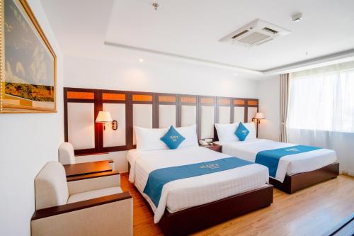 Cama o camas de una habitación en Galliot Hotel Nha Trang