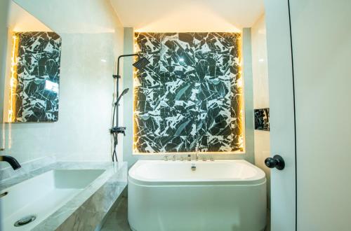 Et badeværelse på Pool Villa Pattaya Nongprue-3Bedroom