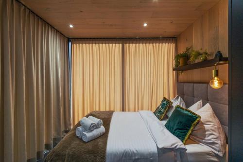 Natur Pur & Erlebnisurlaub im Spiegelhaus ÖÖDにあるベッド