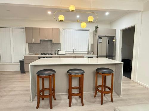 Una cocina o cocineta en Snowflakes - Cooma