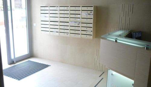 a kitchen with a counter and a window in it at Belle Apartments-Elegance Apartments in Belgrade