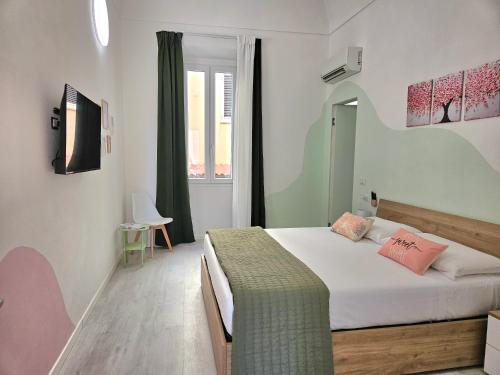 Postel nebo postele na pokoji v ubytování Color Island Home