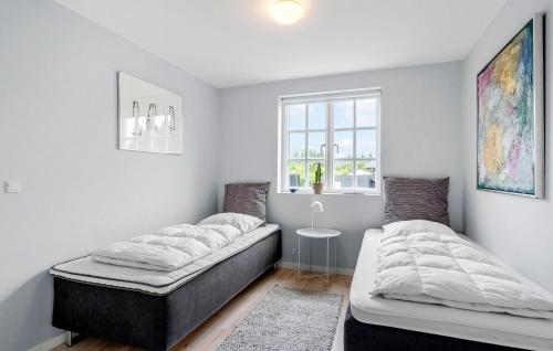Beautiful Home In Ejstrupholm With Wifiにあるベッド