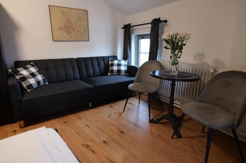Posezení v ubytování Boutique Apartments U Rolanda, Mikulášské náměstí