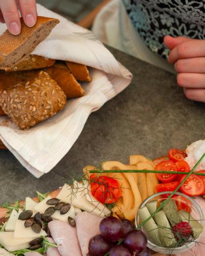 a table with a bunch of different types of food at Dvorec Jeruzalem in Ivanjkovci