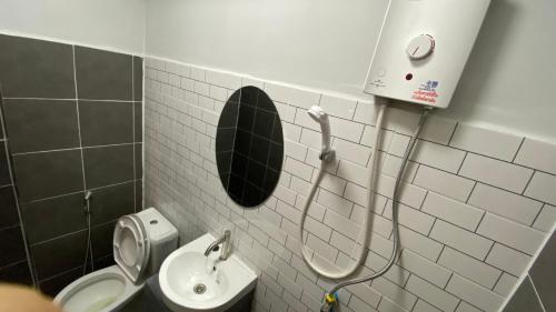 Koupelna v ubytování Capricorn hostel Yaowarat